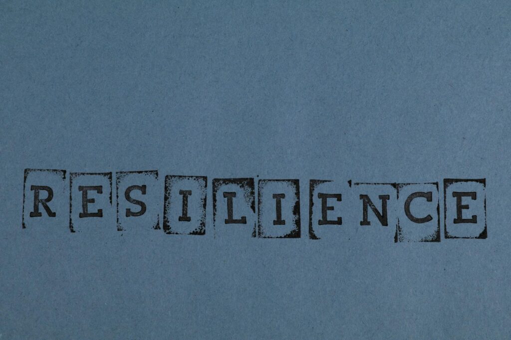 Close-up of letterpress-printed text on uncoated paper, showing how ink behaves on the surface.